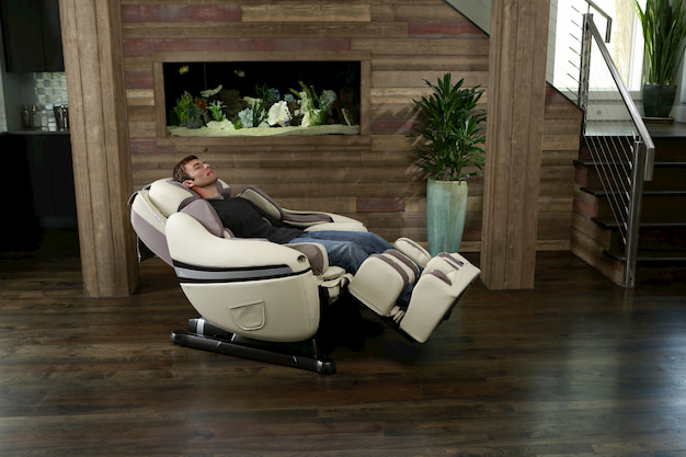 man relaxing on massage chair