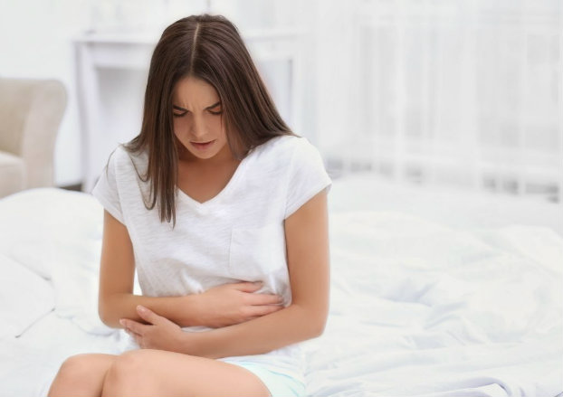bigstock-Young-woman-suffering-from-stomach pain diarrhea medication