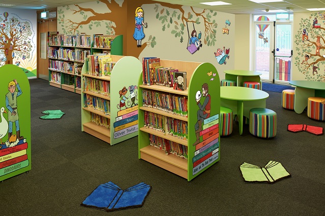 classroom with bookshelves and free standing classroom stands
