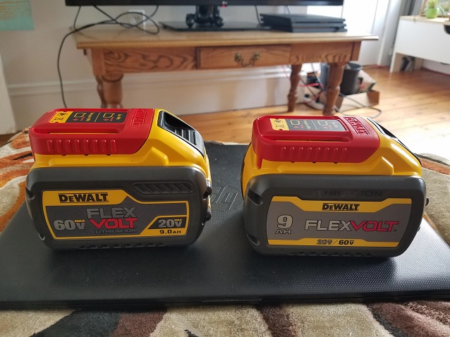 close-up of two dewalt flex volt batteries