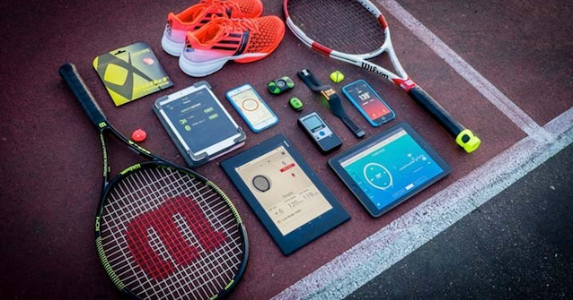 Tennis raquets, trainers and other accessories on court