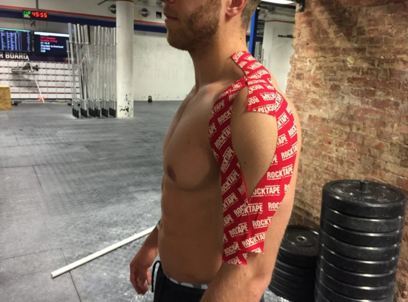 Man in the gym with a rocktape on his hand