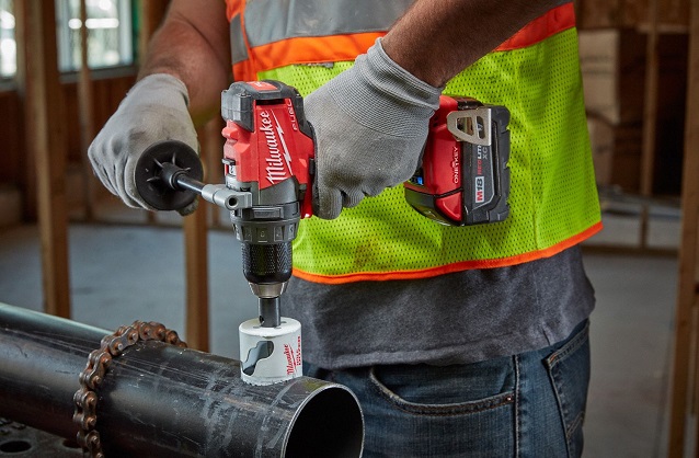 Close-up of working with Milwaukee drill driver