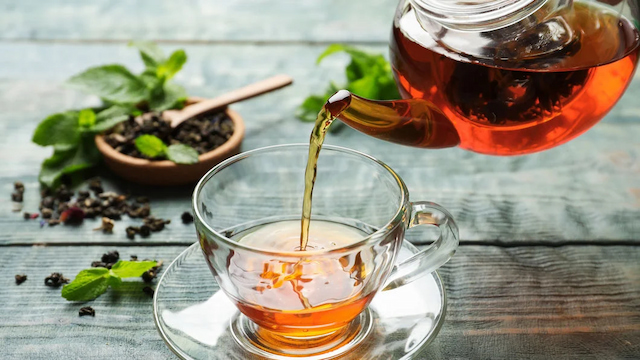 pouring loose leaf herbal tea