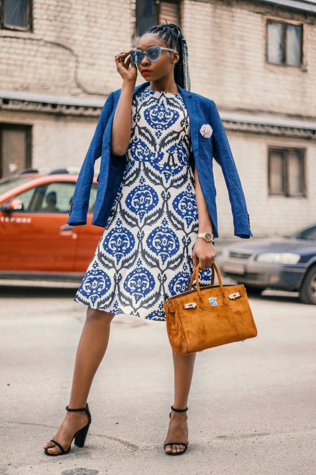 lady wearing a dress and a blazer