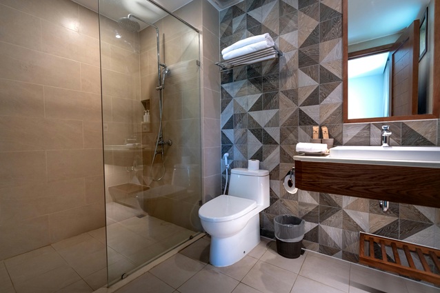 bathroom with a shower panel